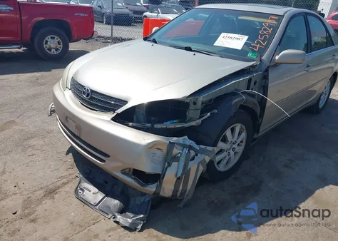 2003 Toyota Camry Xle z USA, uszkodzony, nr VIN 4T1BE30K43U693483